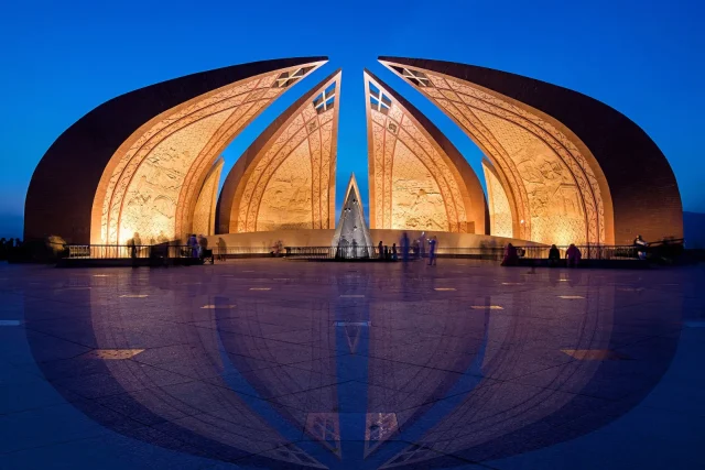 The Pakistan Monument in Islamabad illuminated at blue hour